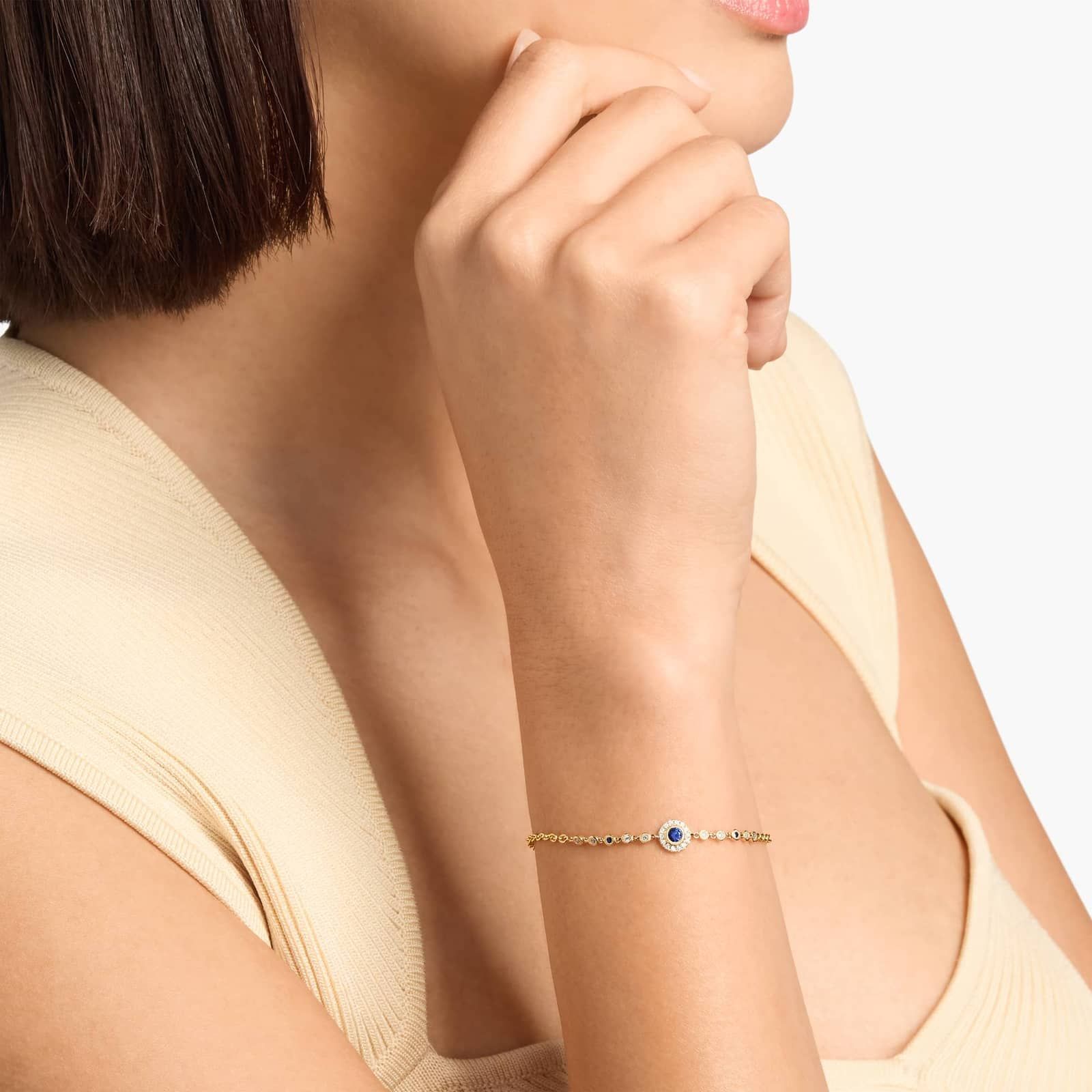 Blue Sapphire and Diamond Halo Chain Bracelet in Yellow Gold