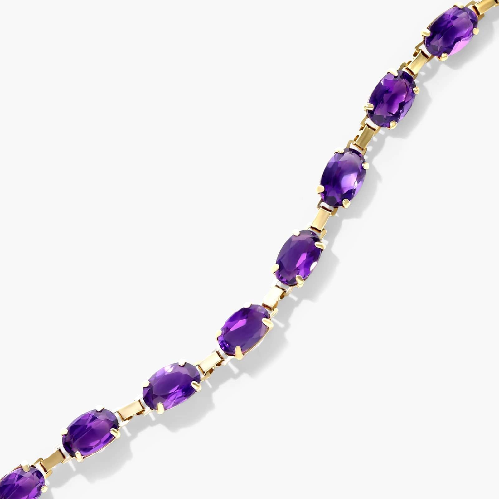 Oval Amethyst Tennis Bracelet in Yellow Gold