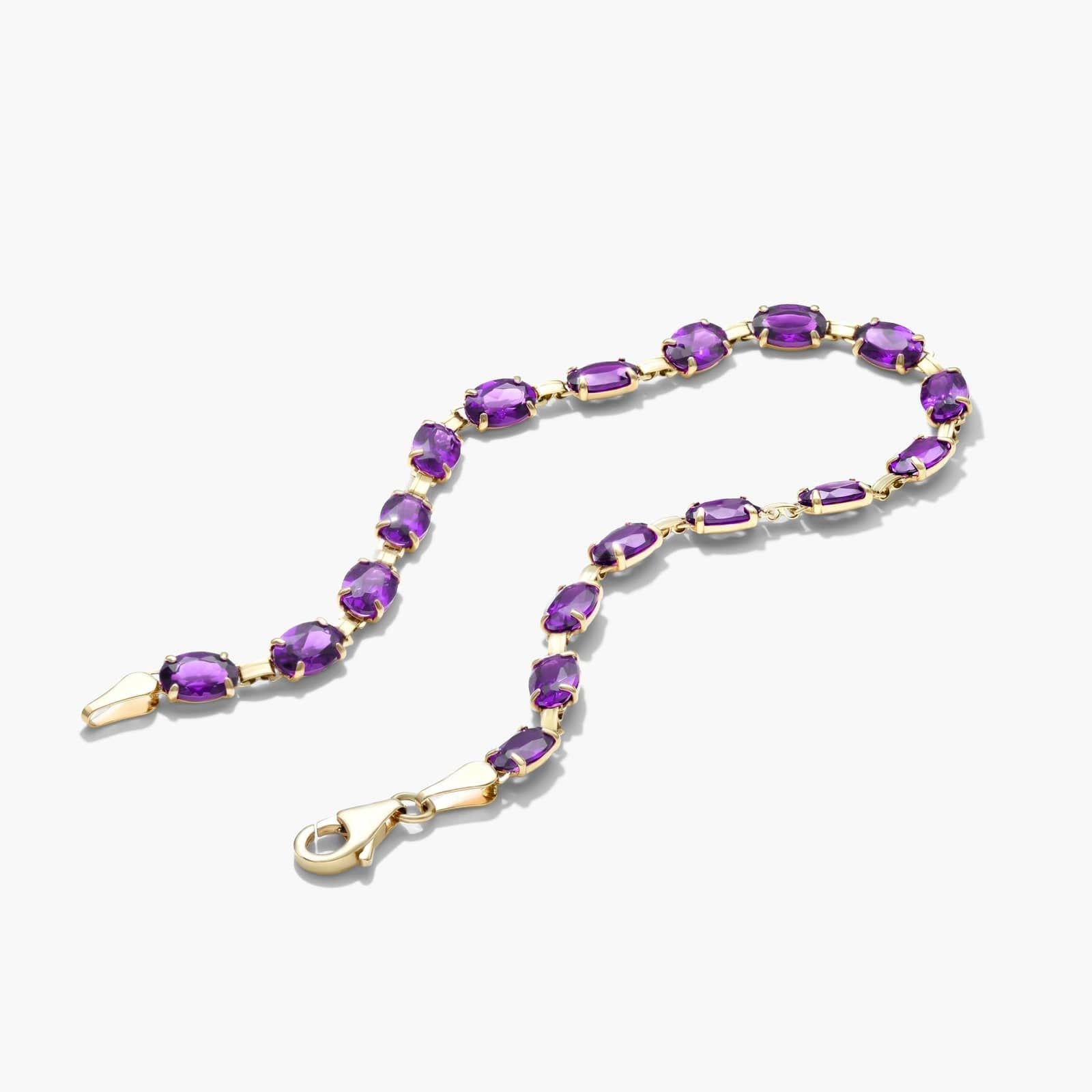 Oval Amethyst Tennis Bracelet in Yellow Gold