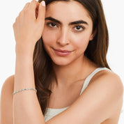 Oval Blue Topaz Tennis Bracelet in Yellow Gold