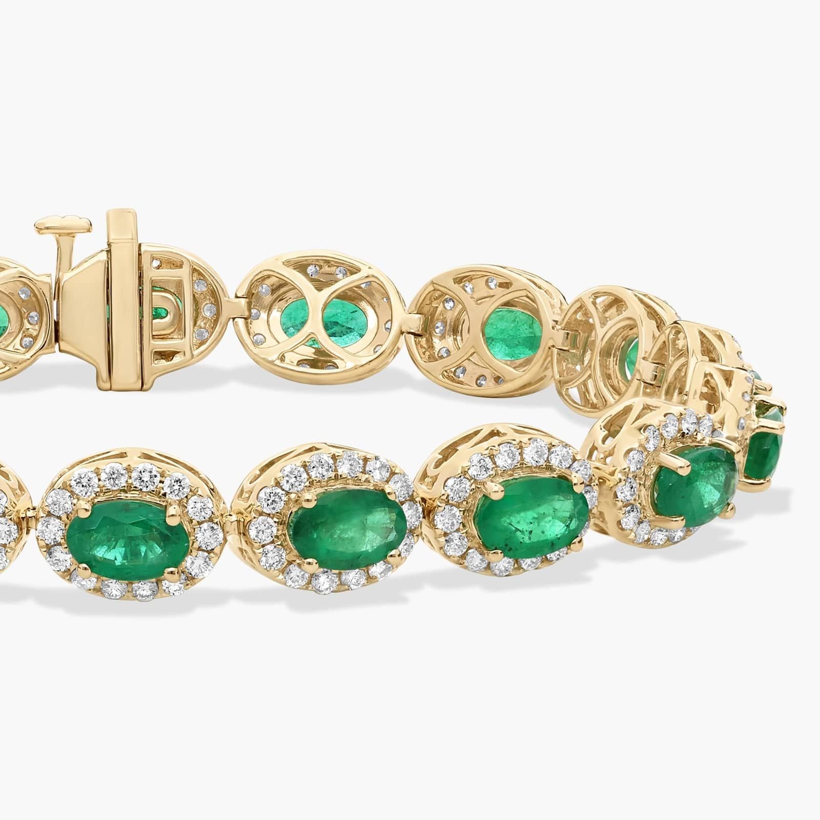 Oval Emerald and Diamond Halo Tennis Bracelet in Yellow Gold