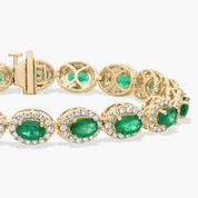 Oval Emerald and Diamond Halo Tennis Bracelet in Yellow Gold
