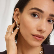 Pear Cut Diamond Solitaire Ring in Yellow Gold with Diamond Accented Band