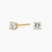 Refined Round Diamond Stud Earrings in Yellow Gold with Push Back Closure