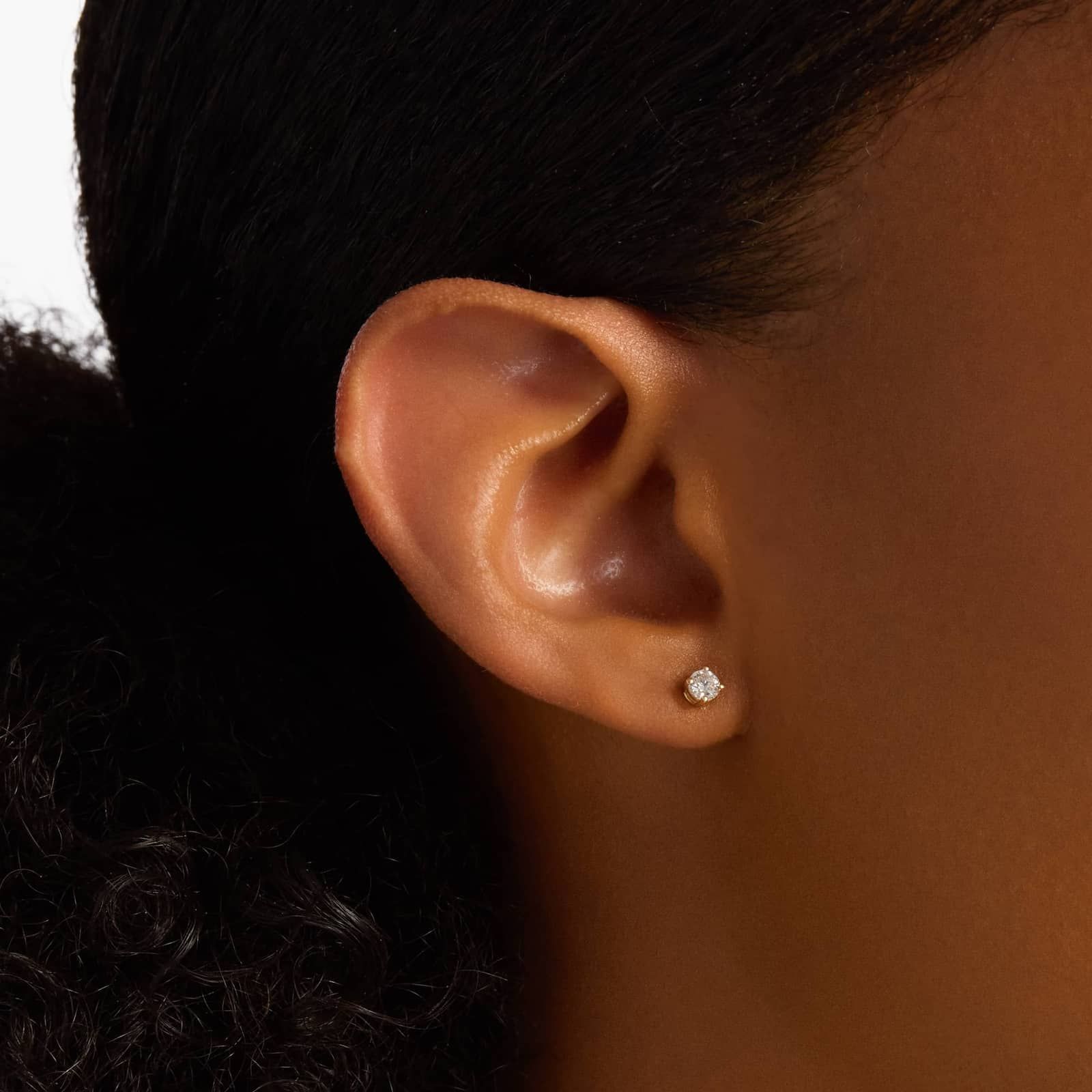 Refined Round Diamond Stud Earrings in Yellow Gold with Push Back Closure