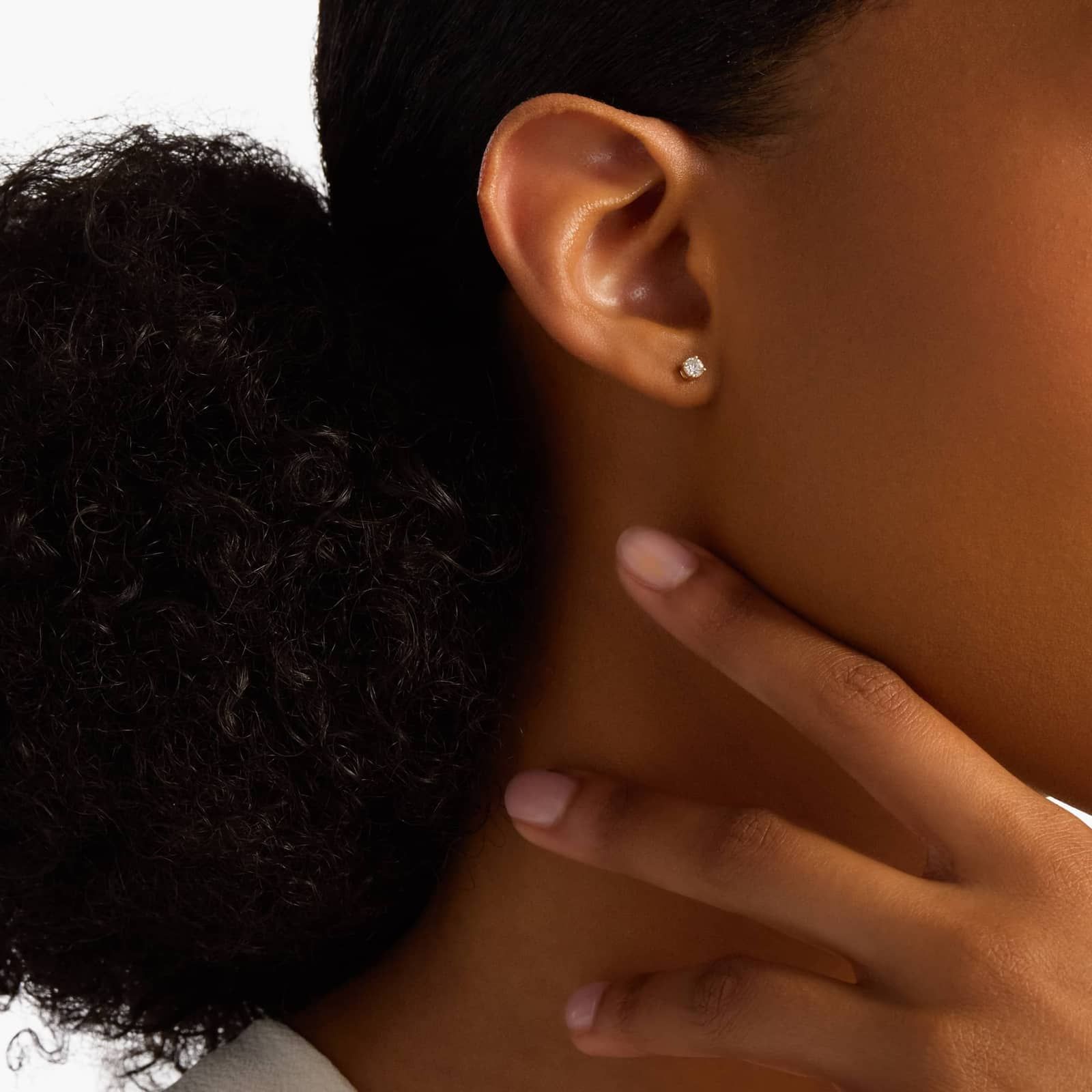 Refined Round Diamond Stud Earrings in Yellow Gold with Push Back Closure