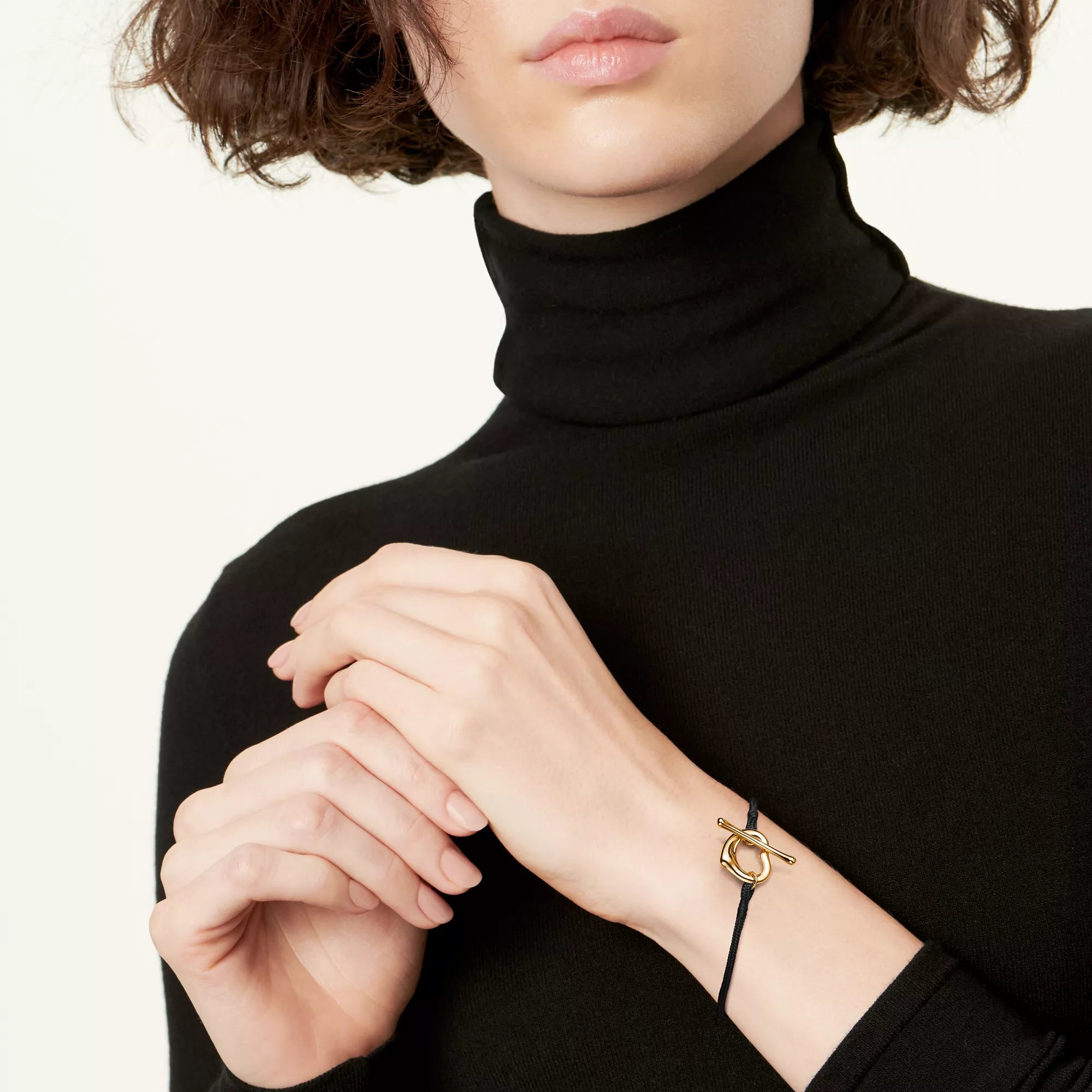 carave-paris-black-cord-open-heart-gold-bracelet_4_85cf9bd9-9dc5-4e53-8d6f-defac2ccb8a8.webp