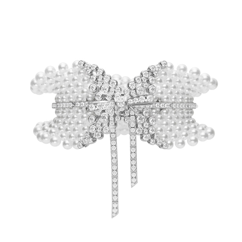 carave-paris-diamond-pearl-bow-cuff-bracelet_5f5e7d14-b731-44a6-b728-681dcc9cd7d2.jpg