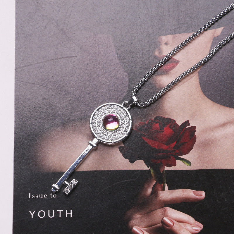 Sterling Silver Diamond Key Pendant Necklace with Center Stone
