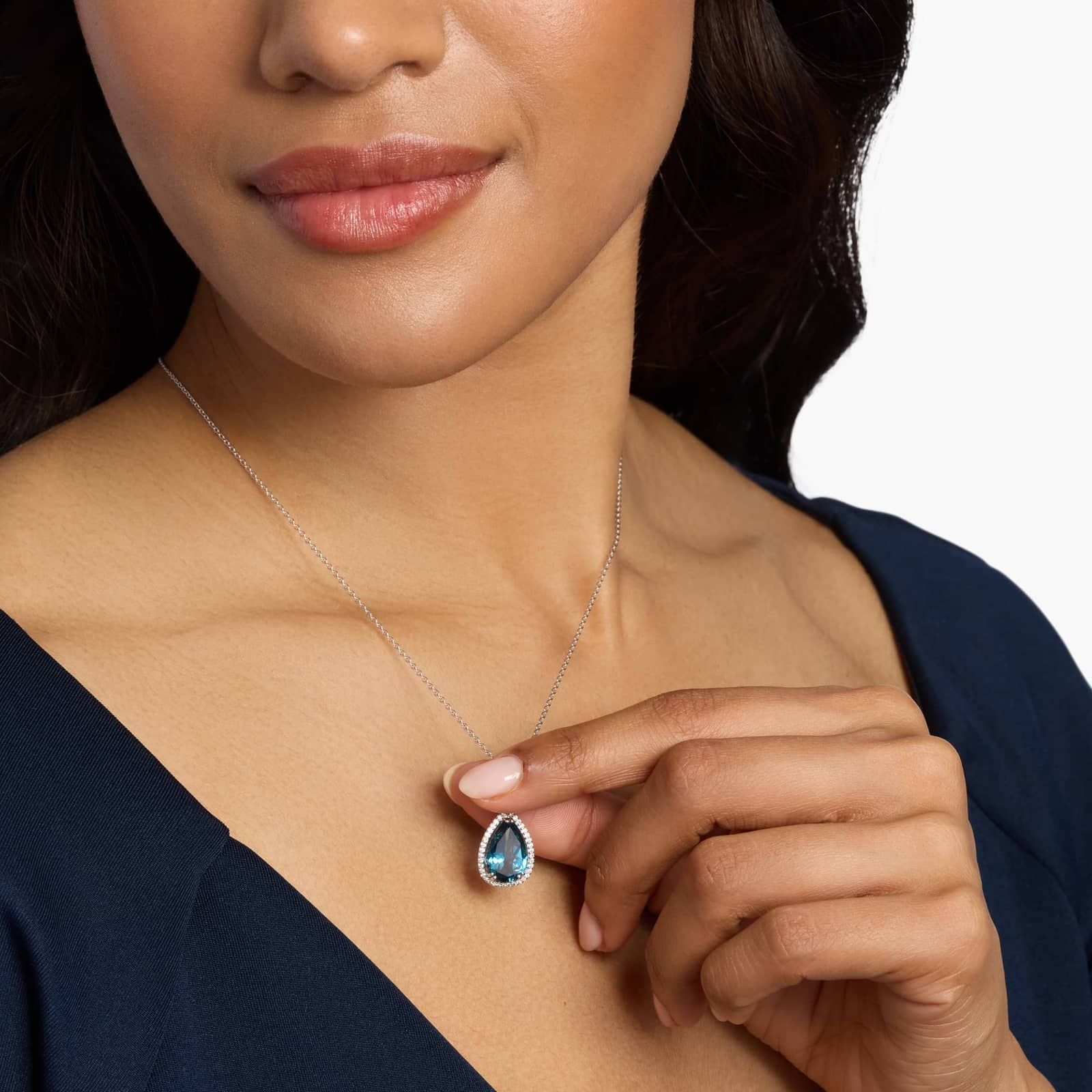 Sterling Silver Pear Blue Topaz Halo Pendant Necklace