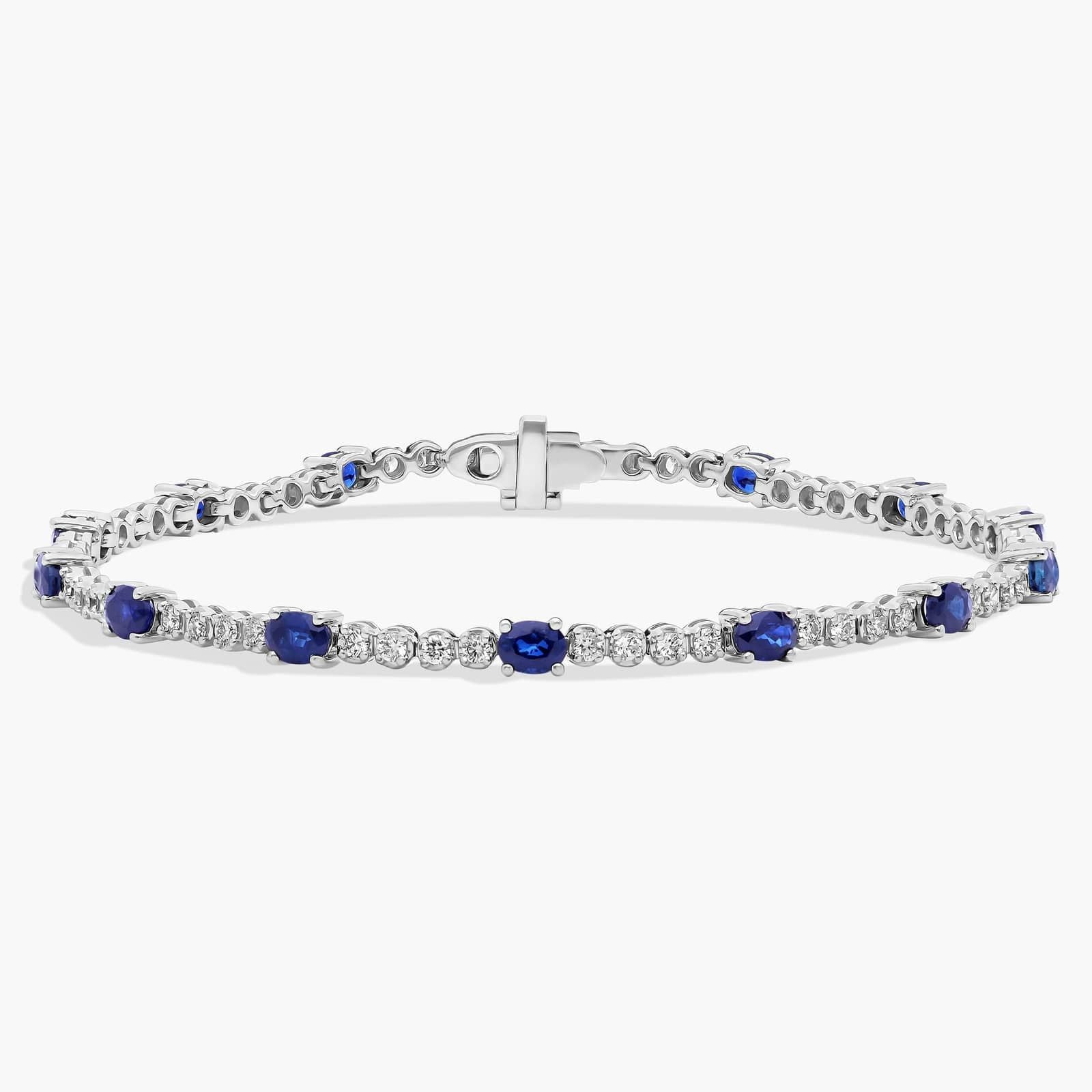 womens-925-sterling-silver-blue-sapphire-tennis-bracelet_4.jpg